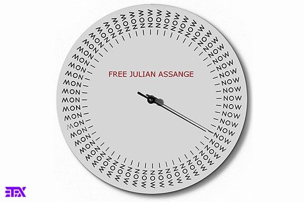 یک ساعت nft که روی آن عبارت «جولیان آسانژ را آزاد کنید» درج شده